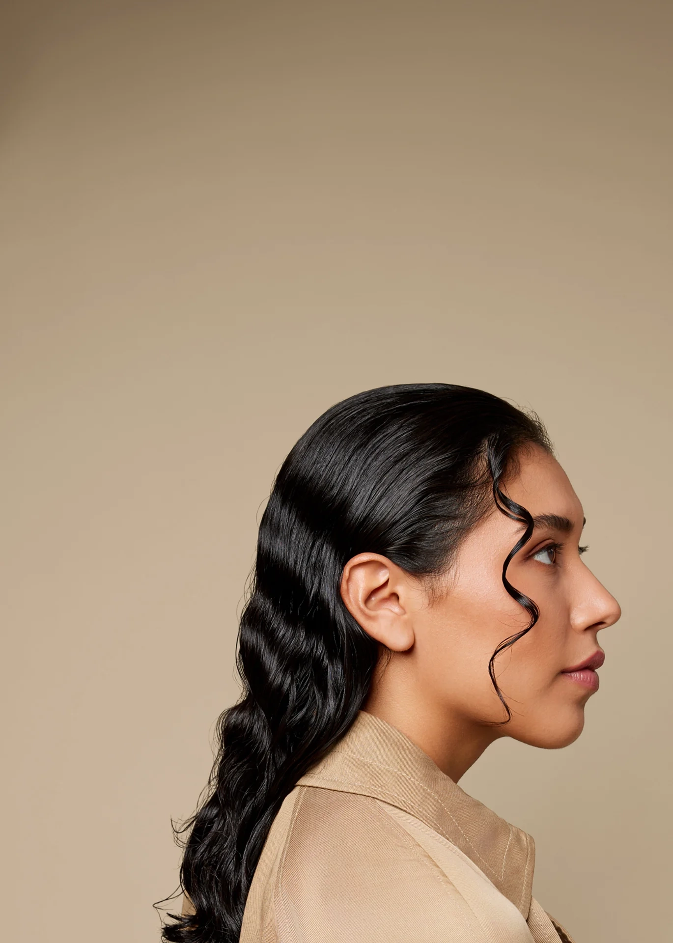 Odele campaign photograph of a model with styled hair